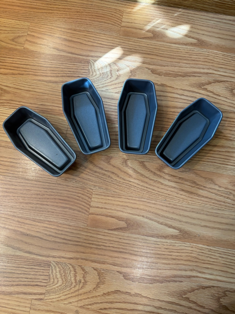 A coffin-shaped mini loaf/cake pan or baking mold,